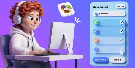 Мальчик в наушниках за компьютером собирает приложение в App Inventor